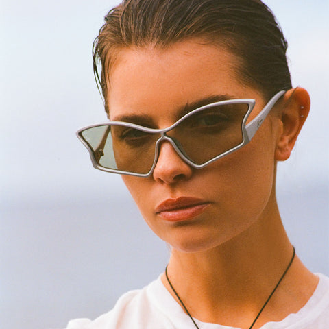 Le Specs Tailfin Matte Silver Female Wrap Sunglasses | Eyewear Index