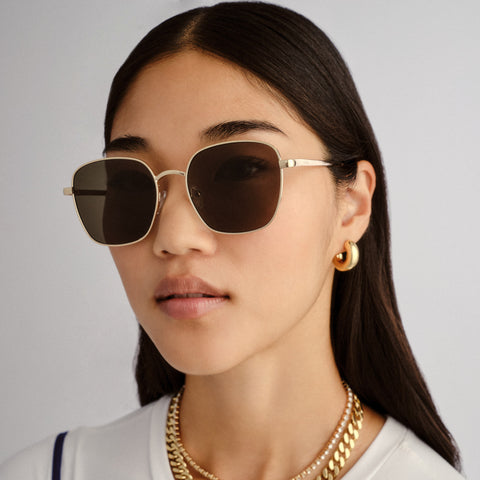 Aire Spiral Gold Female Square Sunglasses | Eyewear Index