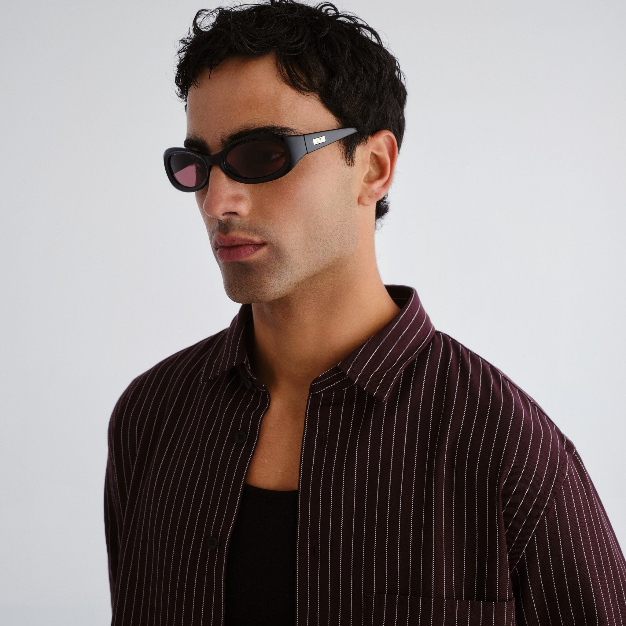 Le Specs Nightcrawler Black Uni-Sex Wrap Sunglasses | Eyewear Index