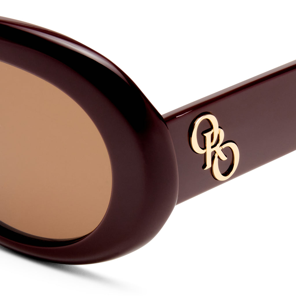 Oroton Soren Burgundy Female Oval Sunglasses | Eyewear Index