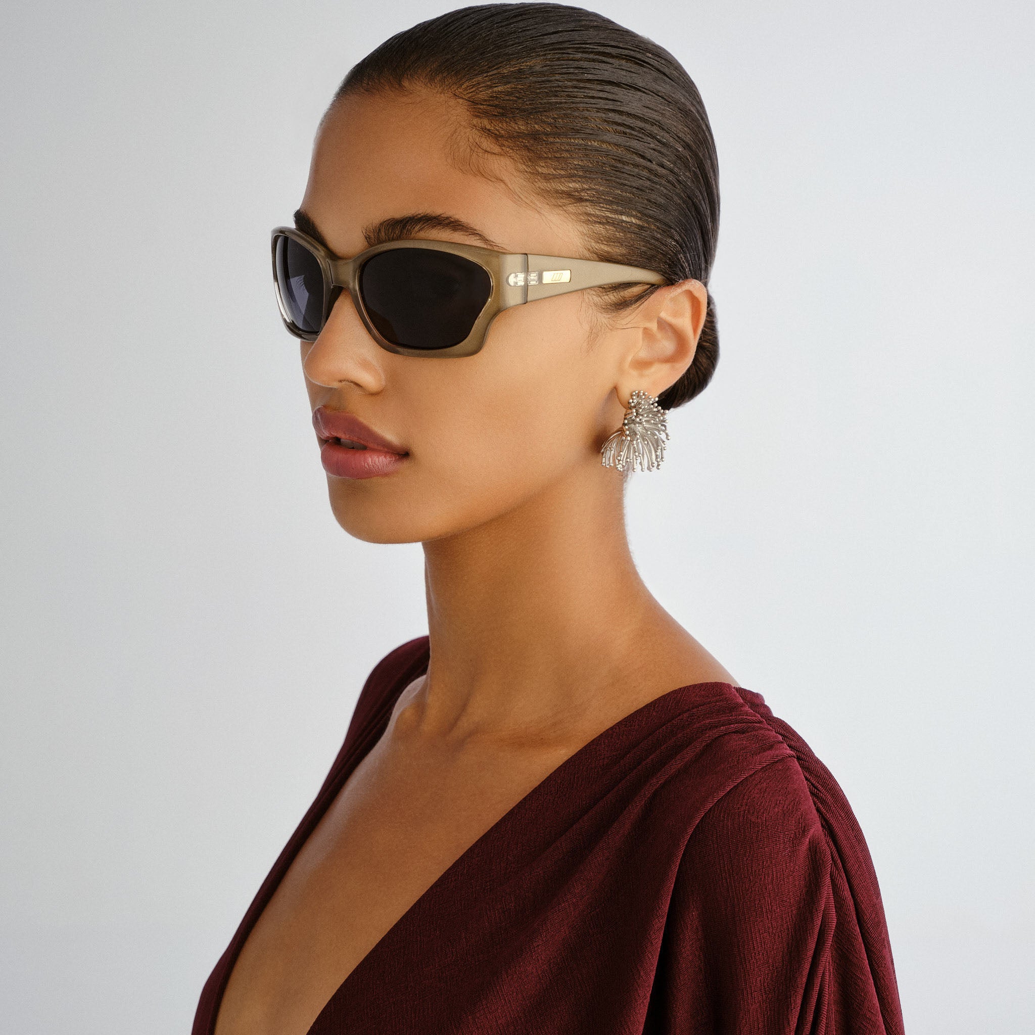 Le Specs Salacious Olive Pearl Uni-Sex Wrap Sunglasses | Eyewear Index