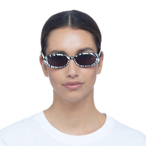 Le Specs Outta Love White Tiger Uni-Sex Oval Sunglasses | Eyewear Index