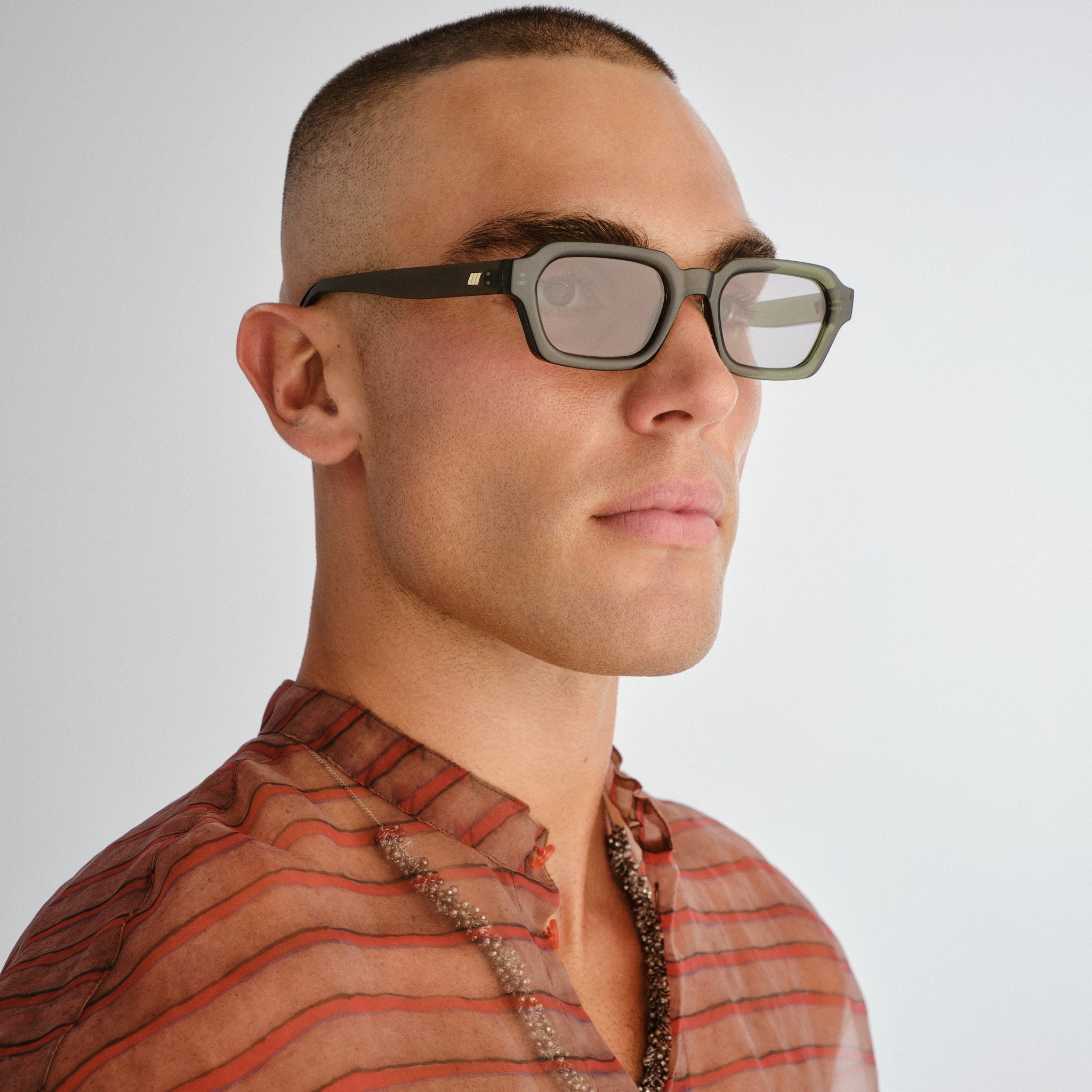 Le Specs Tension + Khaki Uni-Sex Rectangle Sunglasses | Eyewear Index