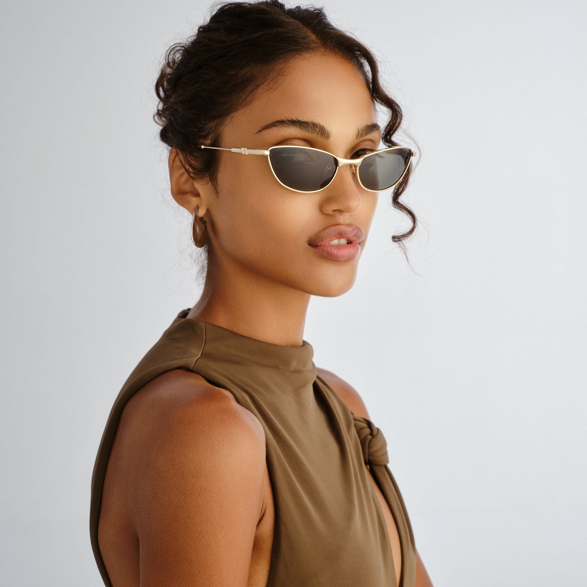 Le Specs Thorned Gold Uni-Sex Oval Sunglasses | Eyewear Index