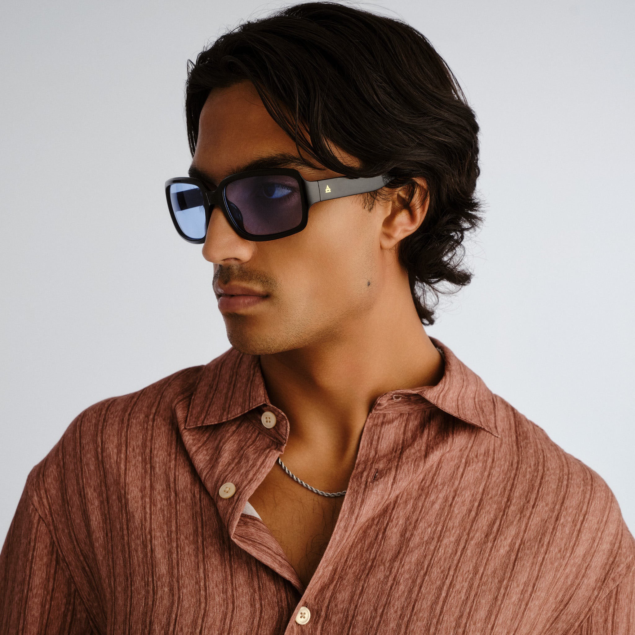 Aire Ignite Black Uni-Sex Wrap Sunglasses | Eyewear Index