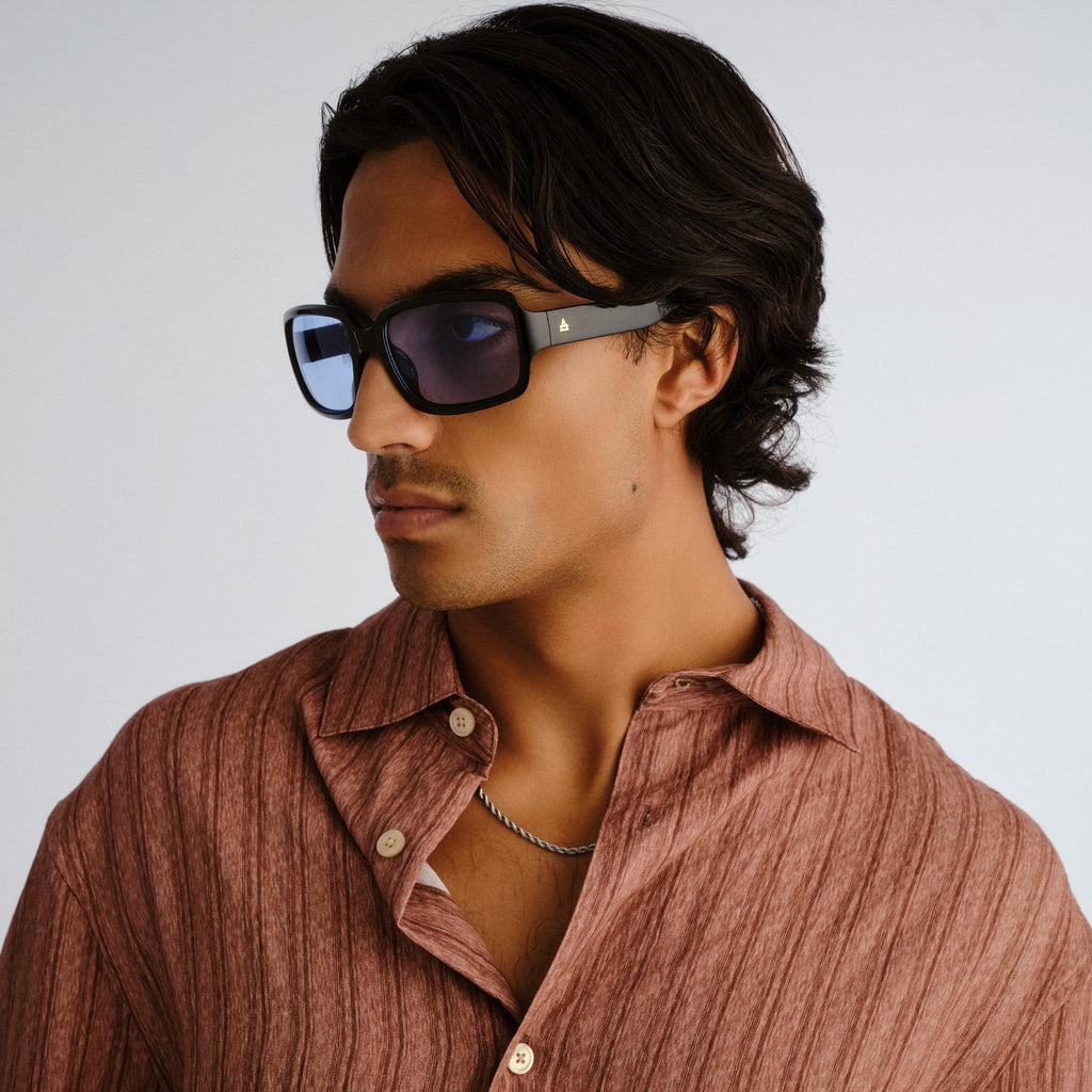 Aire Ignite Black Uni-Sex Wrap Sunglasses | Eyewear Index