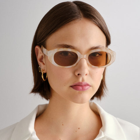 Aire Affinity Yellow Marble Uni-Sex Oval Sunglasses | Eyewear Index