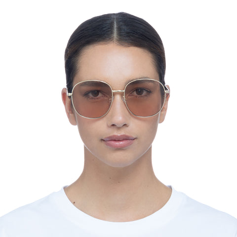 Aire Atria Bright Gold Female Round Sunglasses | Eyewear Index