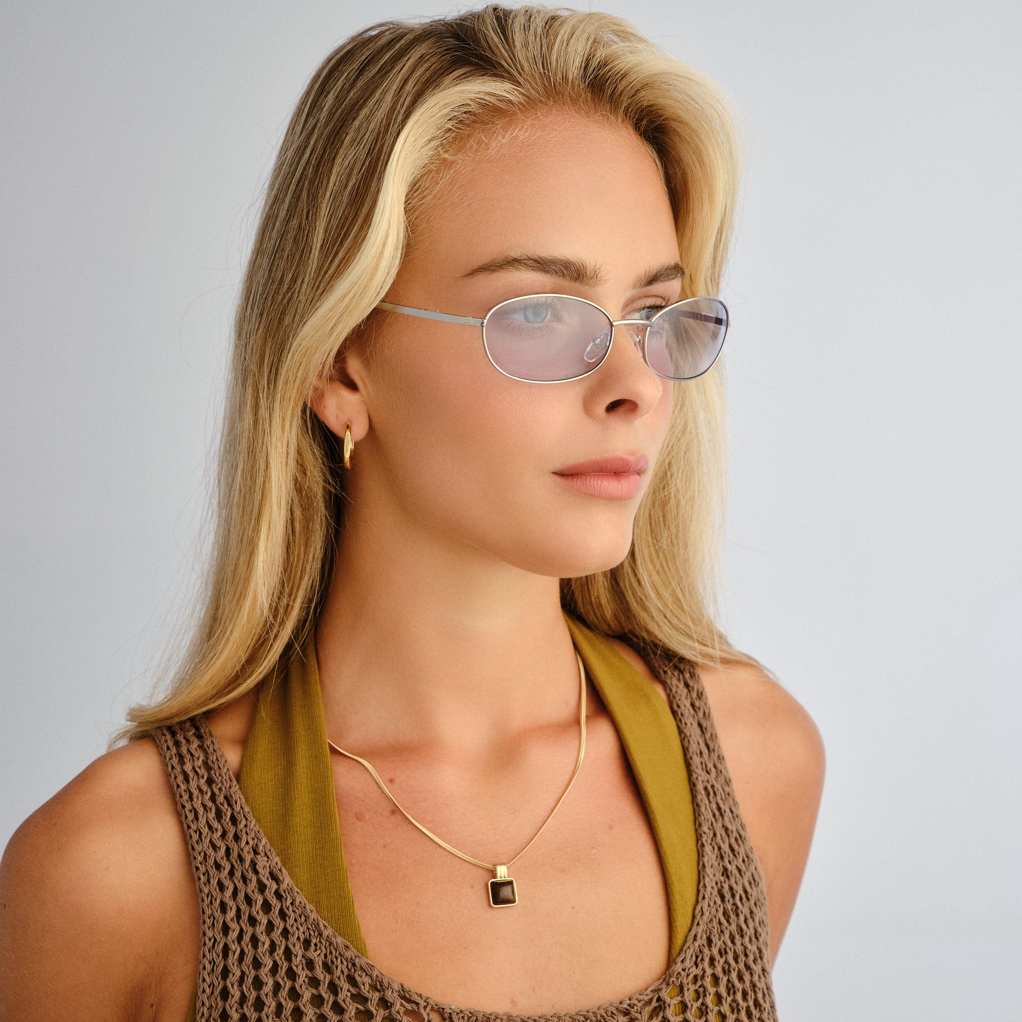 Aire High Beam Silver Clear Uni-Sex Oval Sunglasses | Eyewear Index