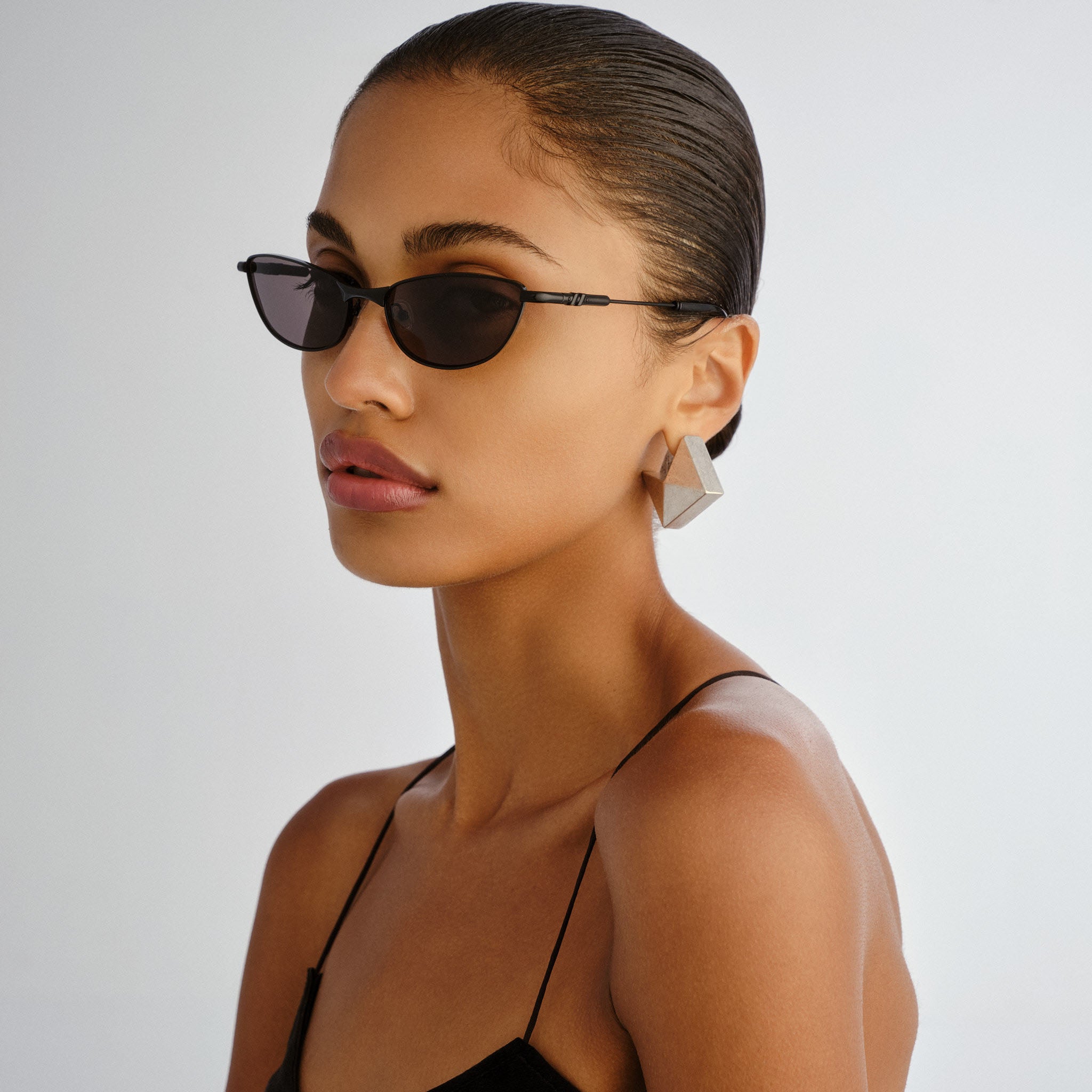 Le Specs Thorned Black Uni-Sex Oval Sunglasses | Eyewear Index
