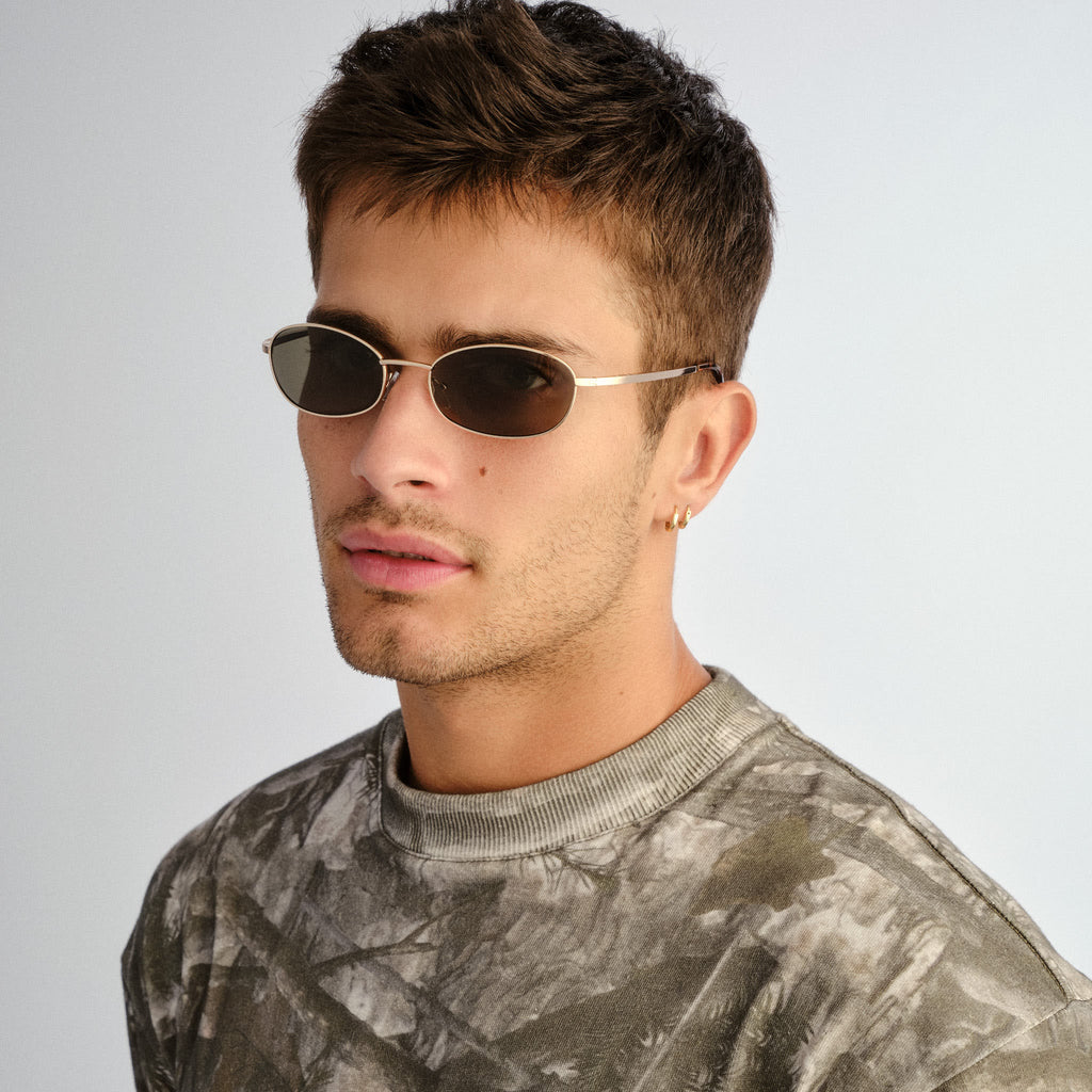Aire High Beam Gold Amber Tort Uni-Sex Oval Sunglasses | Eyewear Index