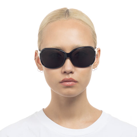 Le Specs Bolshy Black Female Wrap Sunglasses | Eyewear Index