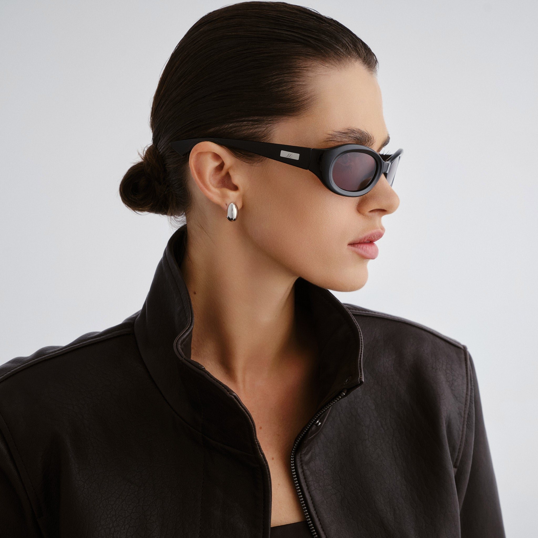 Le Specs Nightcrawler Black Uni-Sex Wrap Sunglasses | Eyewear Index
