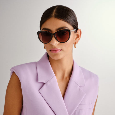 Fiorelli April Black Monogram Female Cat-Eye Sunglasses | Eyewear Index