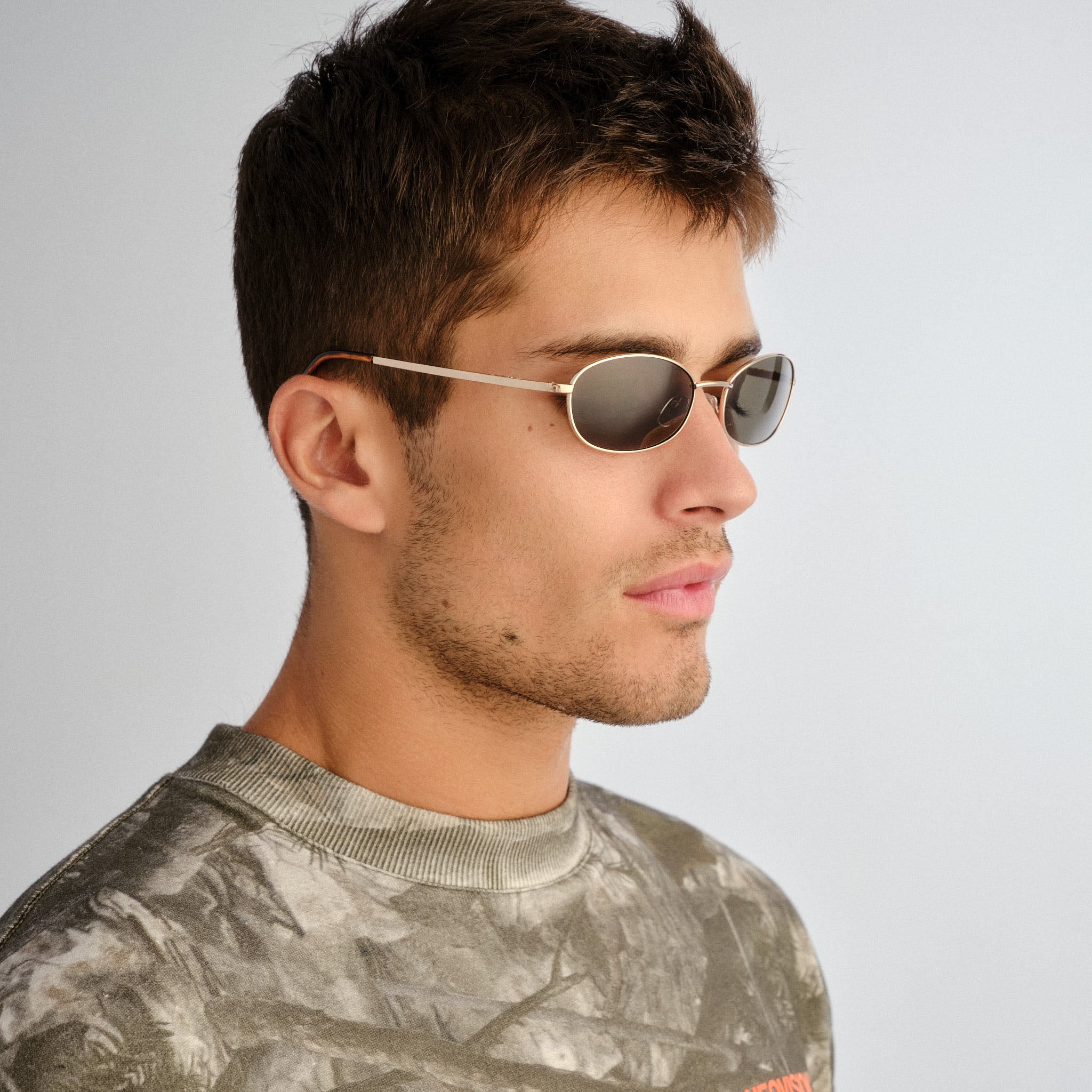 Aire High Beam Gold Amber Tort Uni-Sex Oval Sunglasses | Eyewear Index