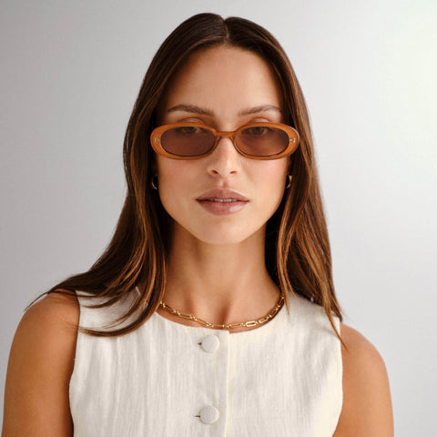 Le Specs Outta Love Caramel Female Oval Sunglasses | Eyewear Index