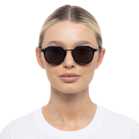 Aire Taures Black Uni-Sex Round Sunglasses | Eyewear Index