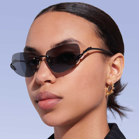 Karen Walker Fleur Black Female Wrap Sunglasses | Eyewear Index