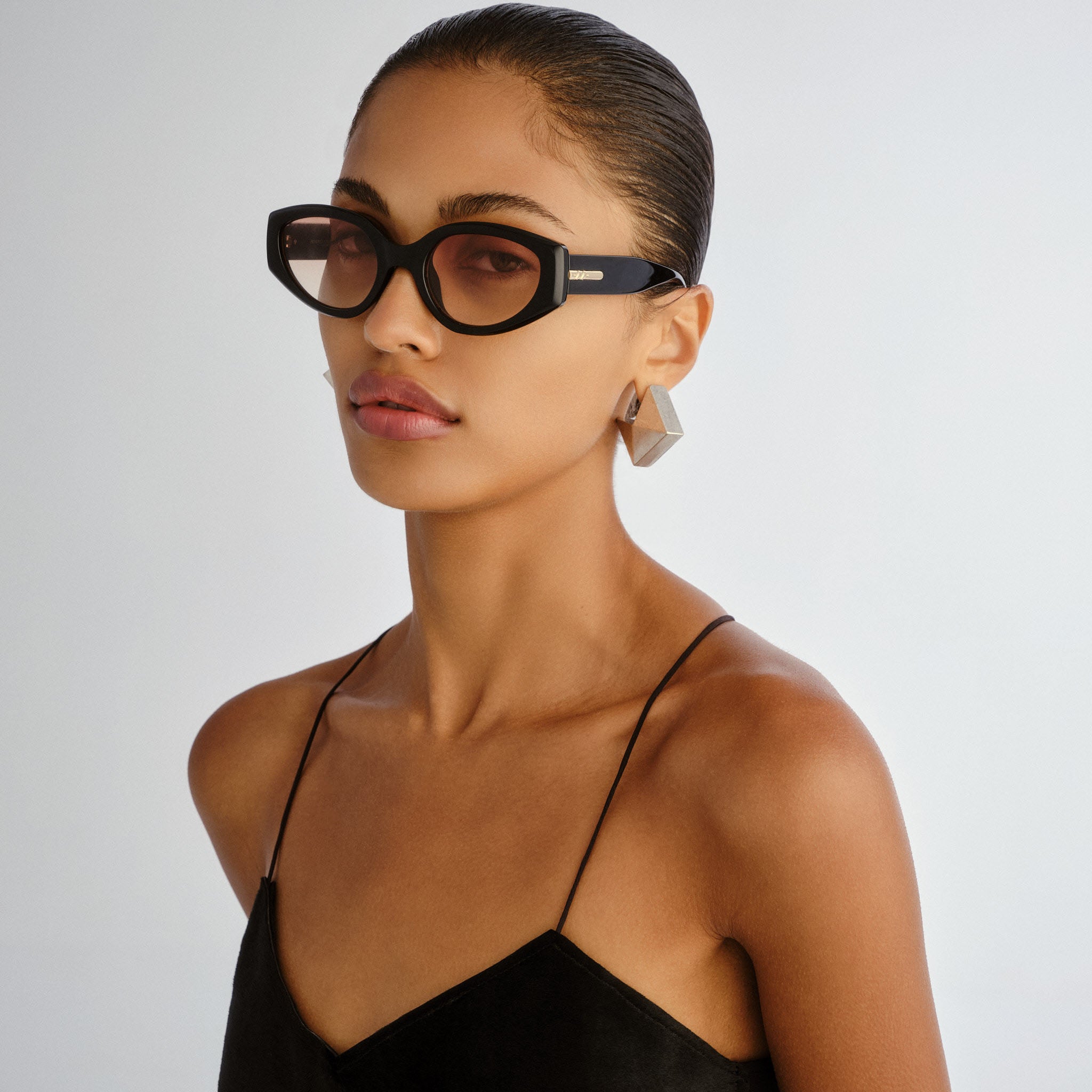 Le Specs Fevered + Black Female Oval Sunglasses | Eyewear Index
