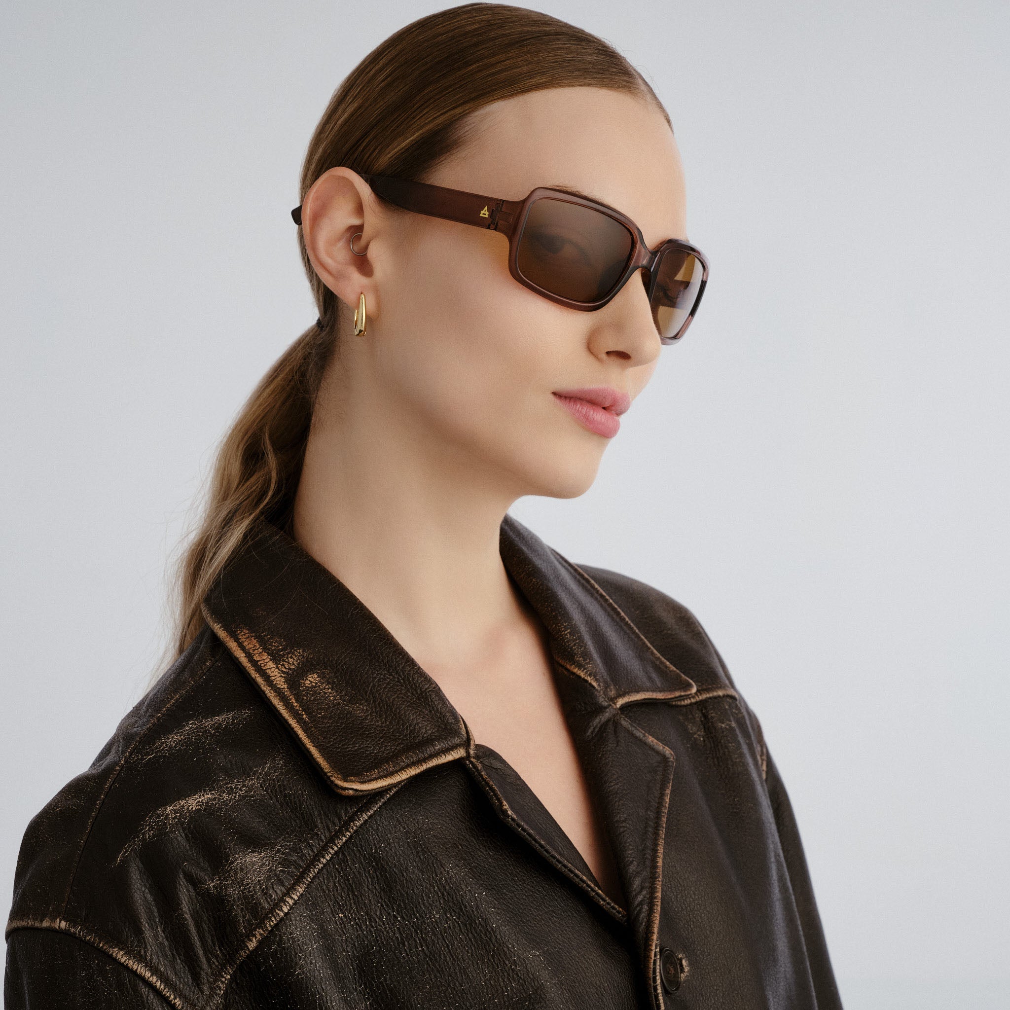 Aire Ignite Espresso Uni-Sex Wrap Sunglasses | Eyewear Index