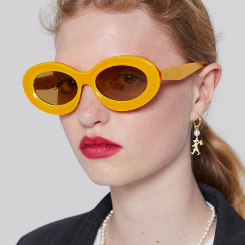 Karen Walker Rapture Marigold Multi Uni-Sex Oval Sunglasses | Eyewear Index