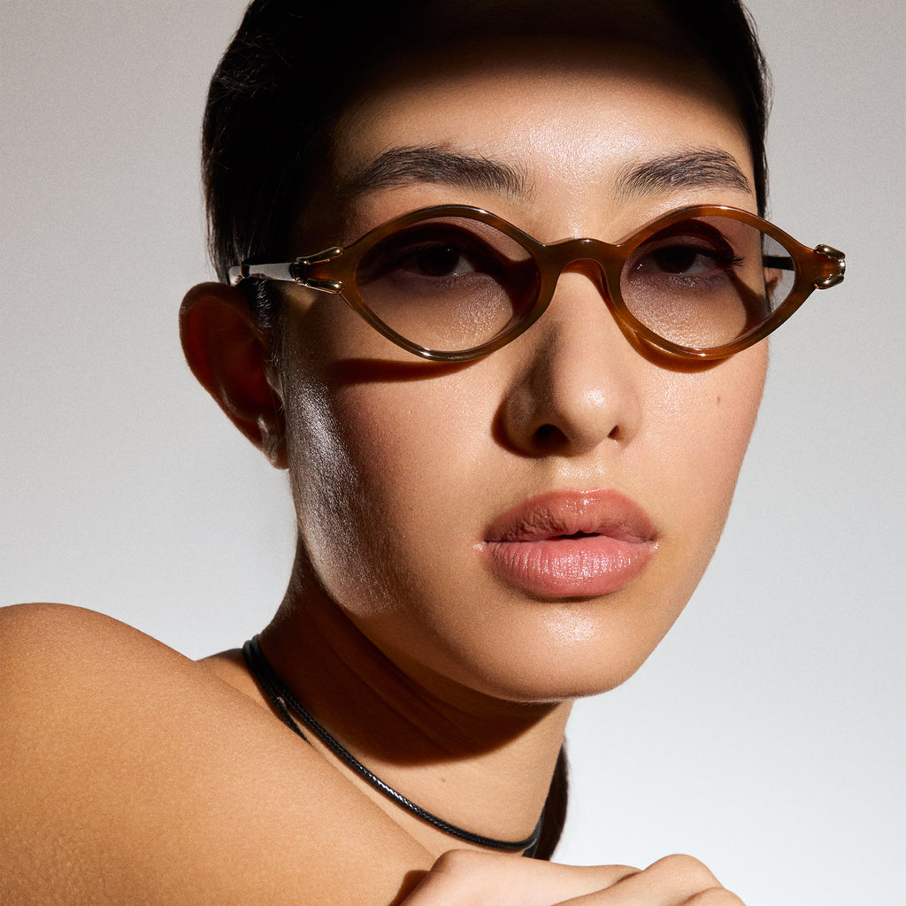 Le Specs Numero Trece Teak Female Oval Sunglasses | Eyewear Index