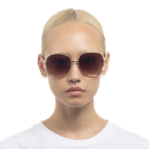 Fiorelli Morgan Gold Dark Tort Female Round Sunglasses | Eyewear Index