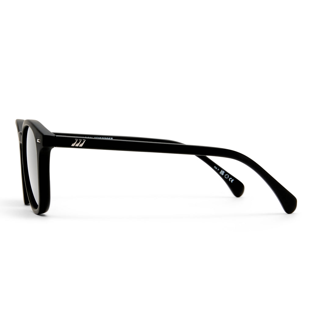 Le Specs Bandwagon Black Rubber Uni-Sex Round Sunglasses | Eyewear Index