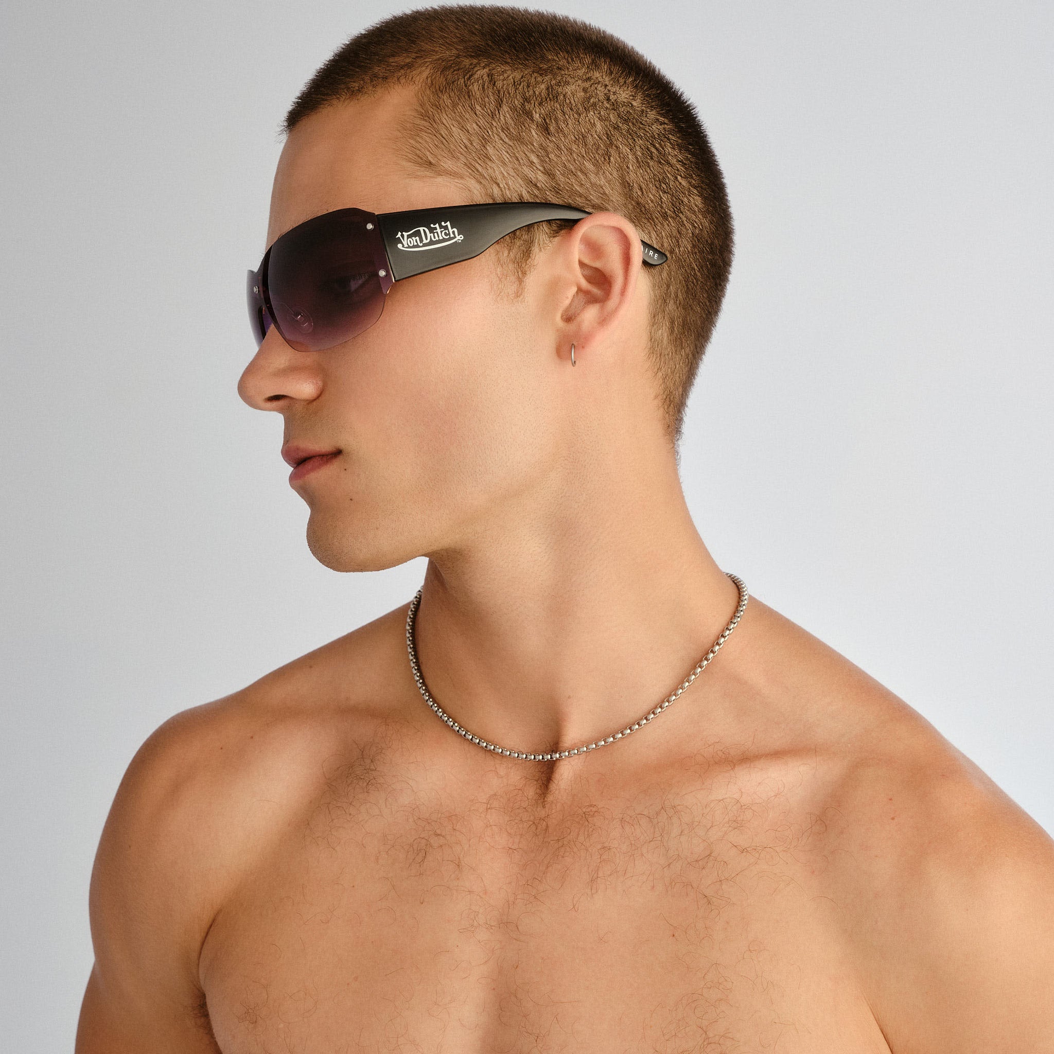 Aire Tabloid Gold Black Uni-Sex Wrap Sunglasses | Eyewear Index