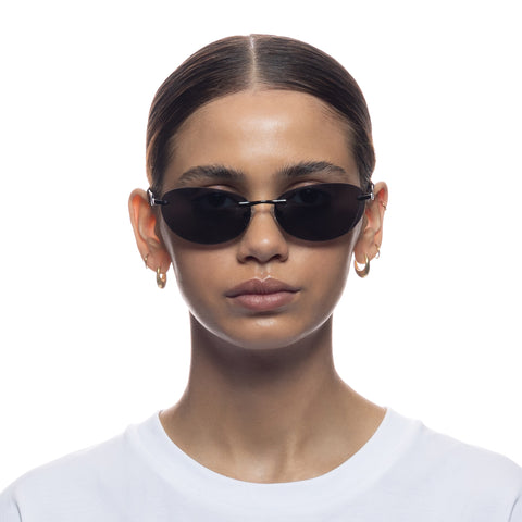 Le Specs Slinky Matte Black Uni-Sex Oval Sunglasses | Eyewear Index