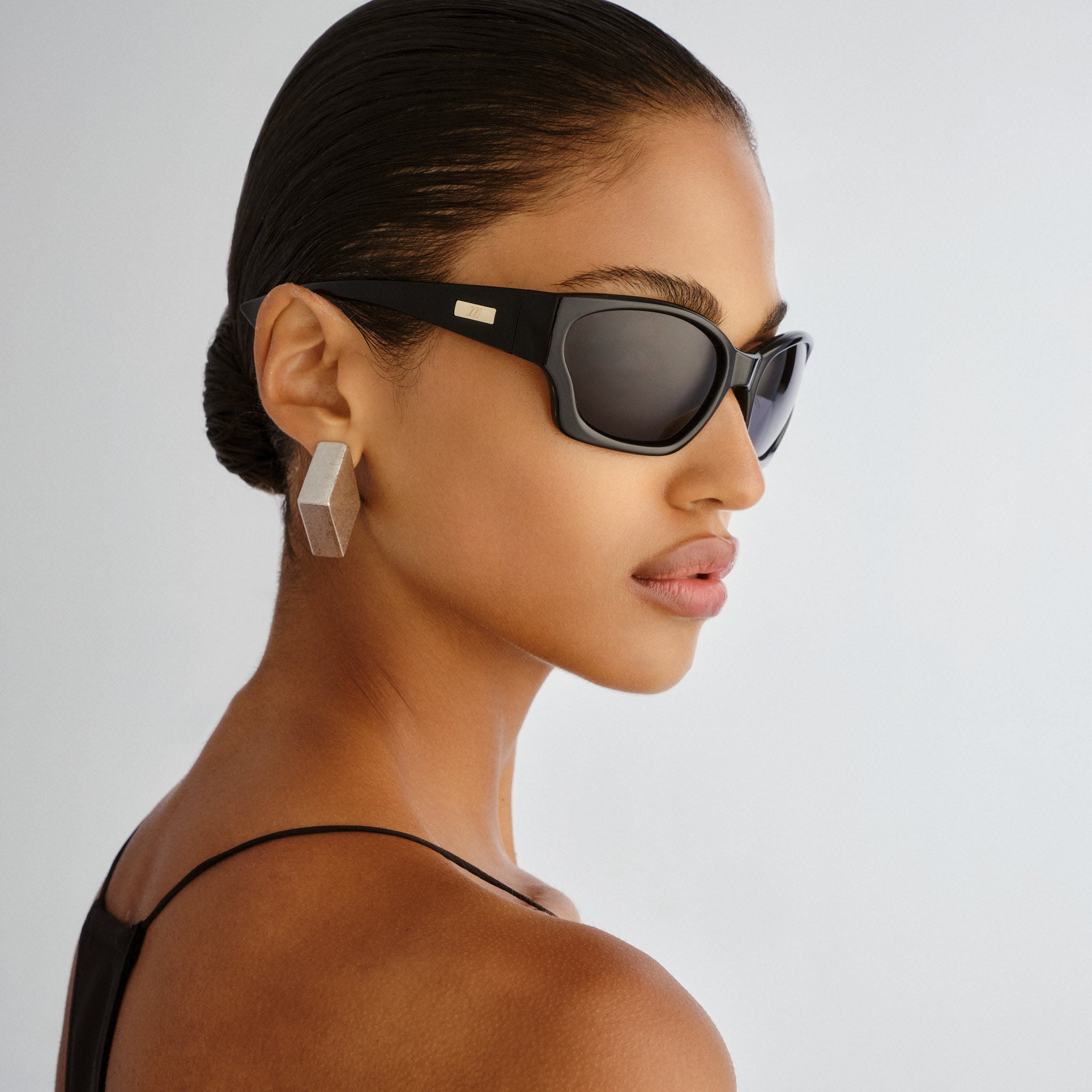 Le Specs Salacious Black Uni-Sex Wrap Sunglasses | Eyewear Index