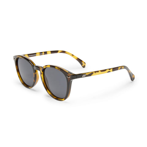 Le Specs Bandwagon Syrup Tort Uni-Sex Round Sunglasses | Eyewear Index