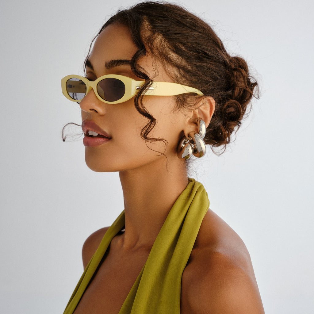 Le Specs Belladonna Acid Yellow Pearl Female Oval Sunglasses | Eyewear Index