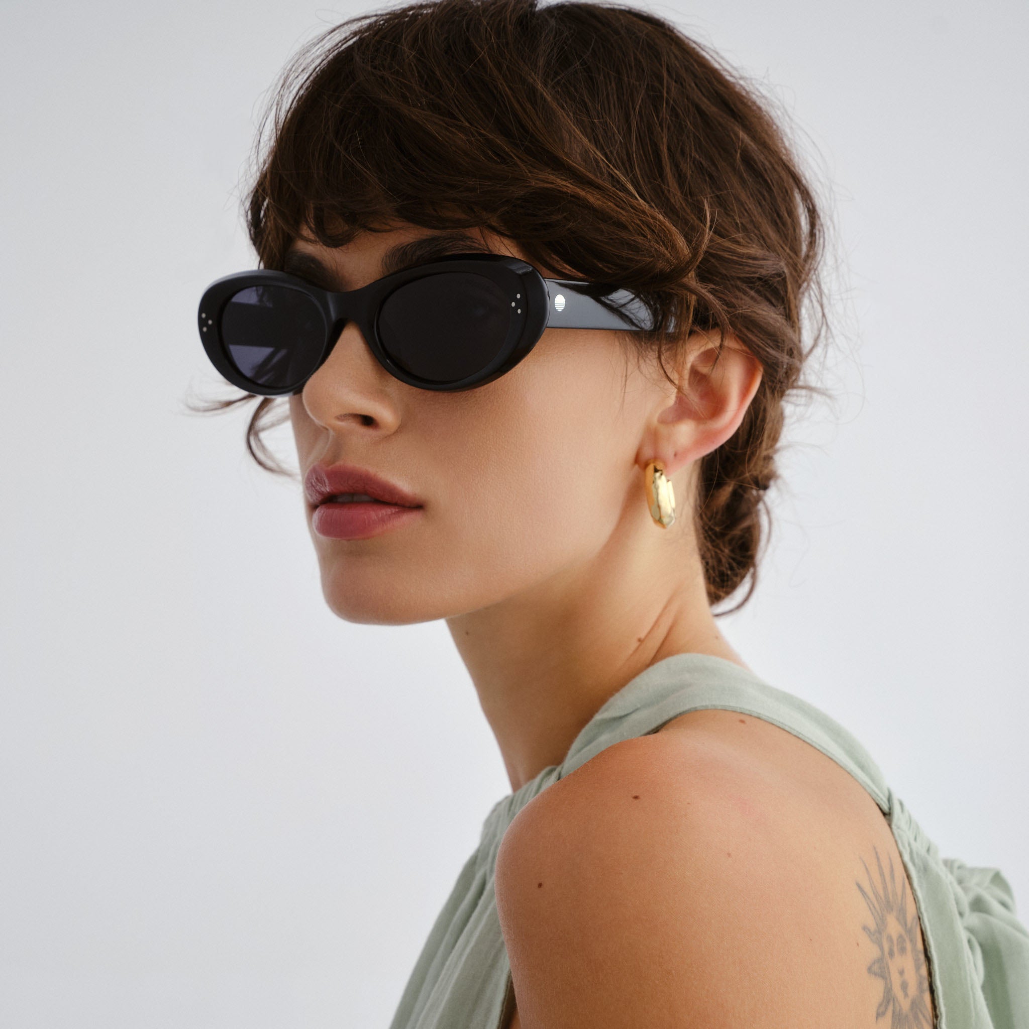 Solarized Almond Oval Black Uni-Sex Oval Sunglasses | Eyewear Index