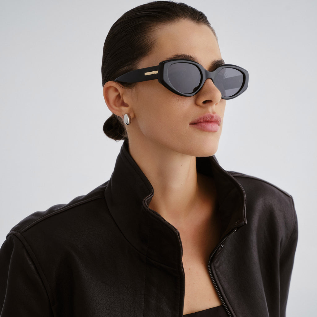 Le Specs Fevered + Black Female Oval Sunglasses | Eyewear Index