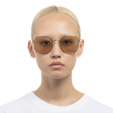 Le Specs Metamorphosis Gold Female Round Sunglasses | Eyewear Index