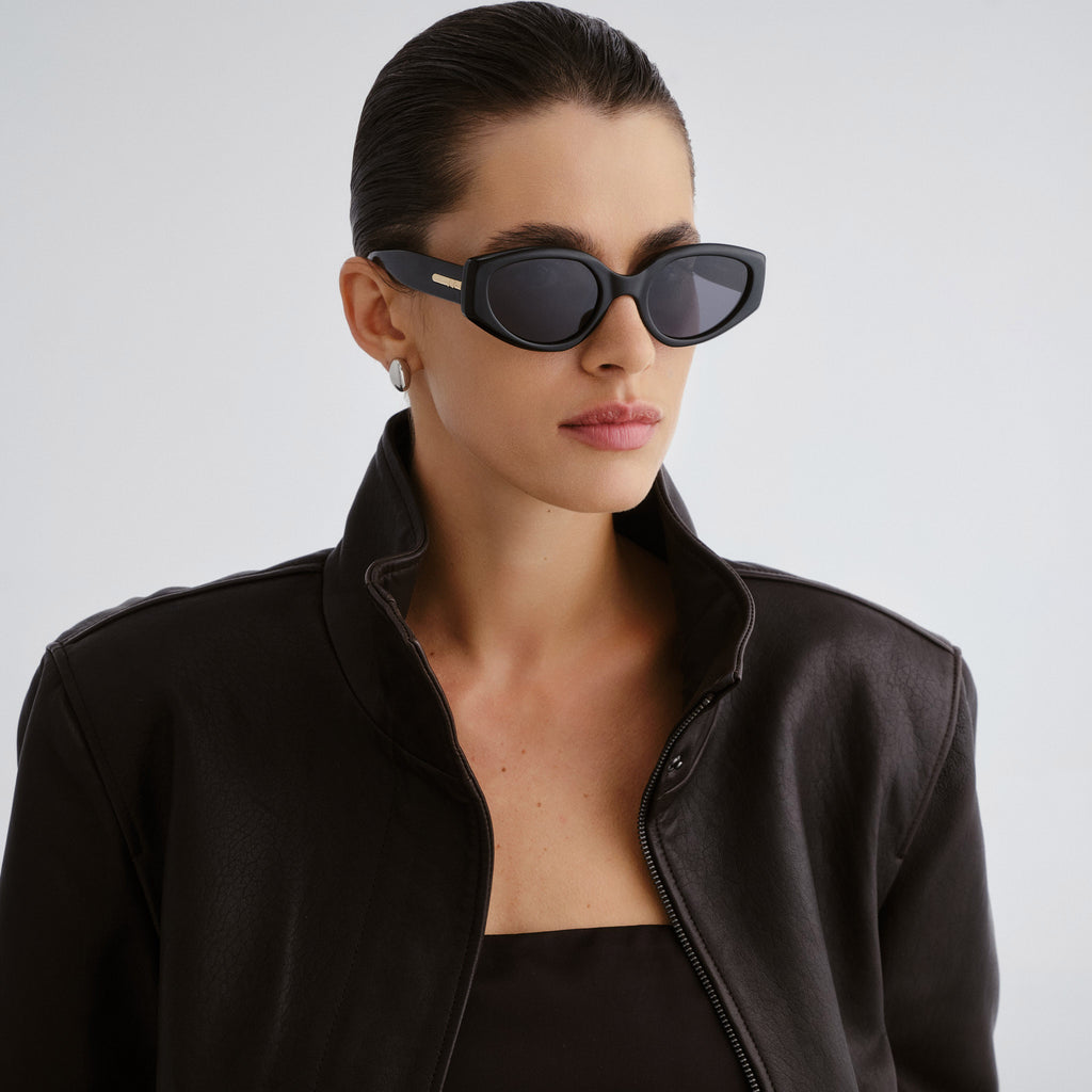 Le Specs Fevered + Black Female Oval Sunglasses | Eyewear Index