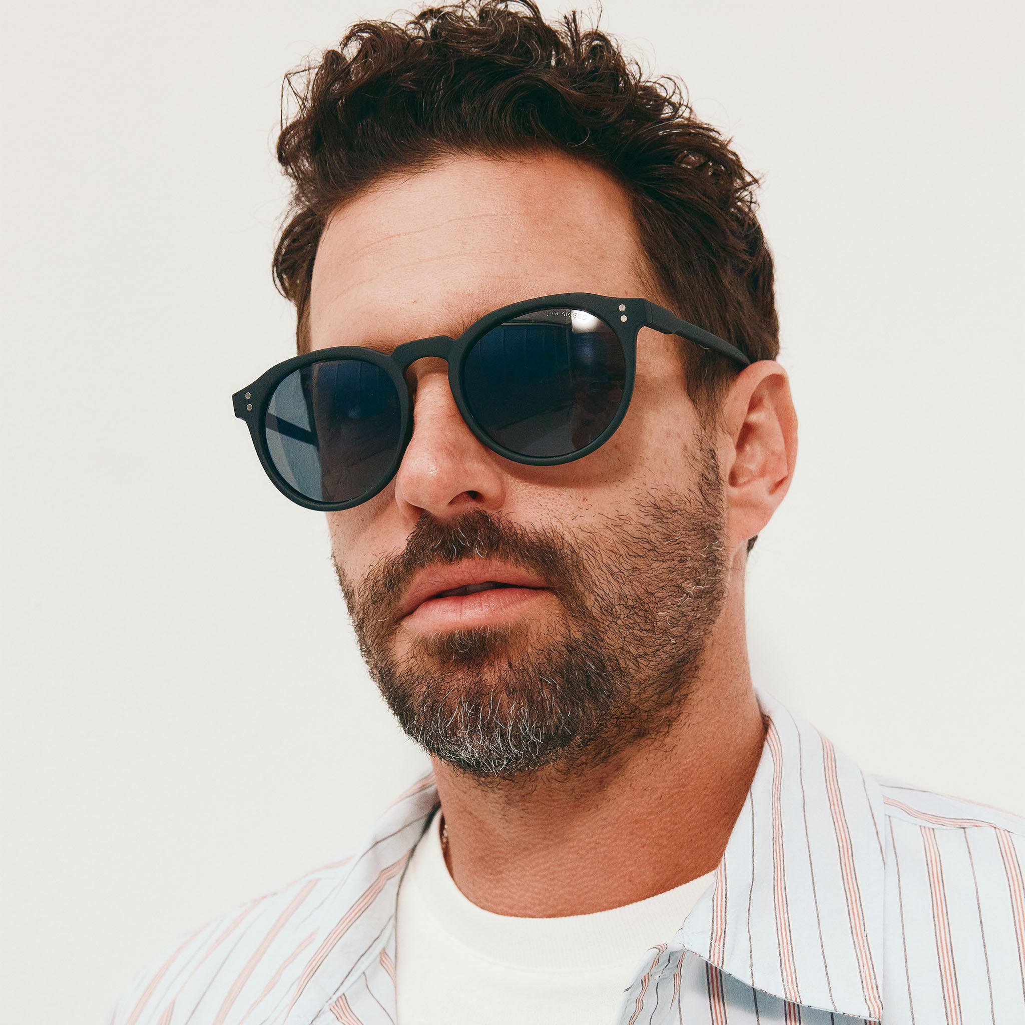 Cancer Council Bright Black Rubber Uni-Sex Round Sunglasses | Eyewear Index