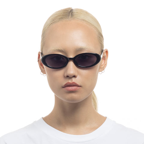 Aire Fornax Black Female Oval Sunglasses | Eyewear Index