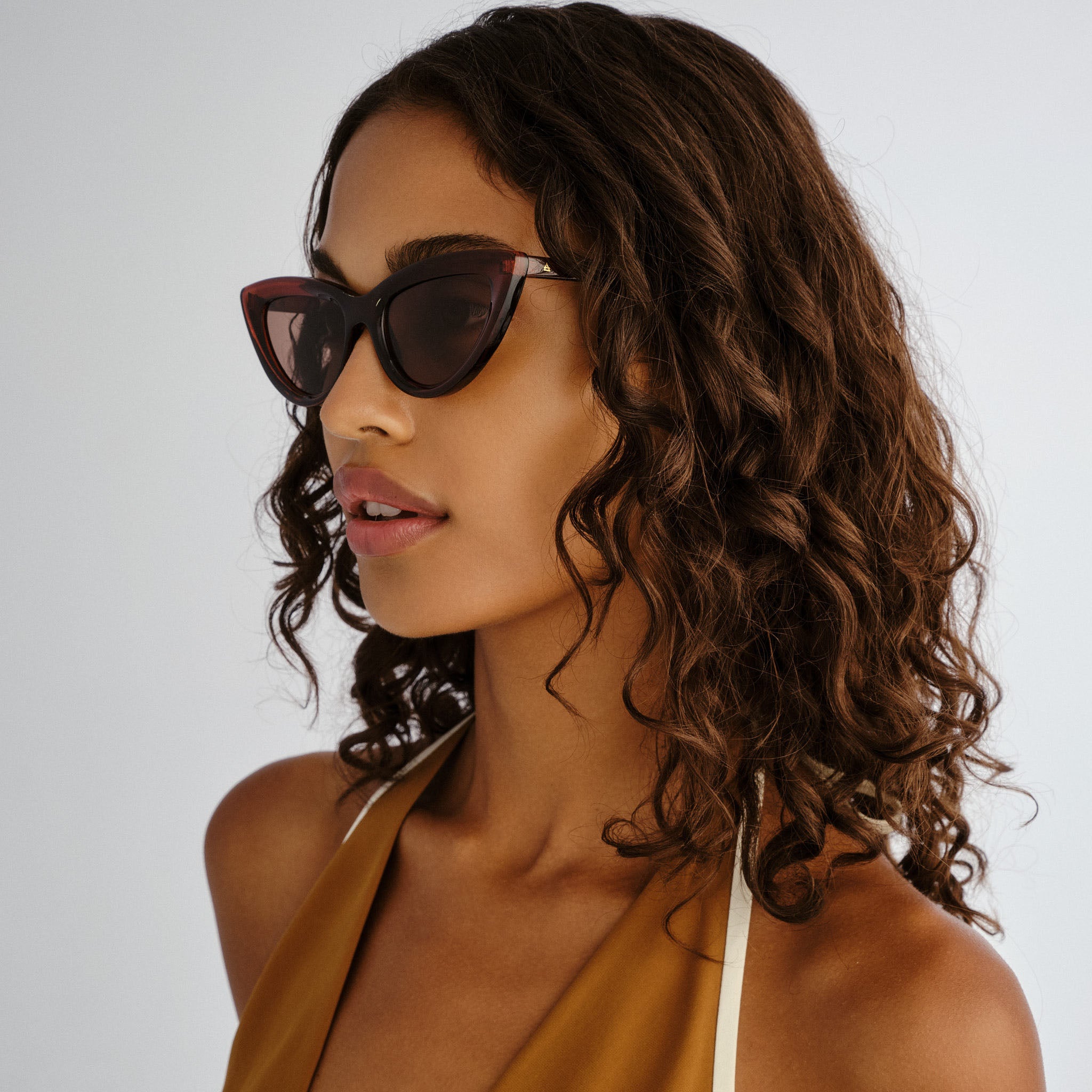 Aire Realm Auburn Female Cat-Eye Sunglasses | Eyewear Index