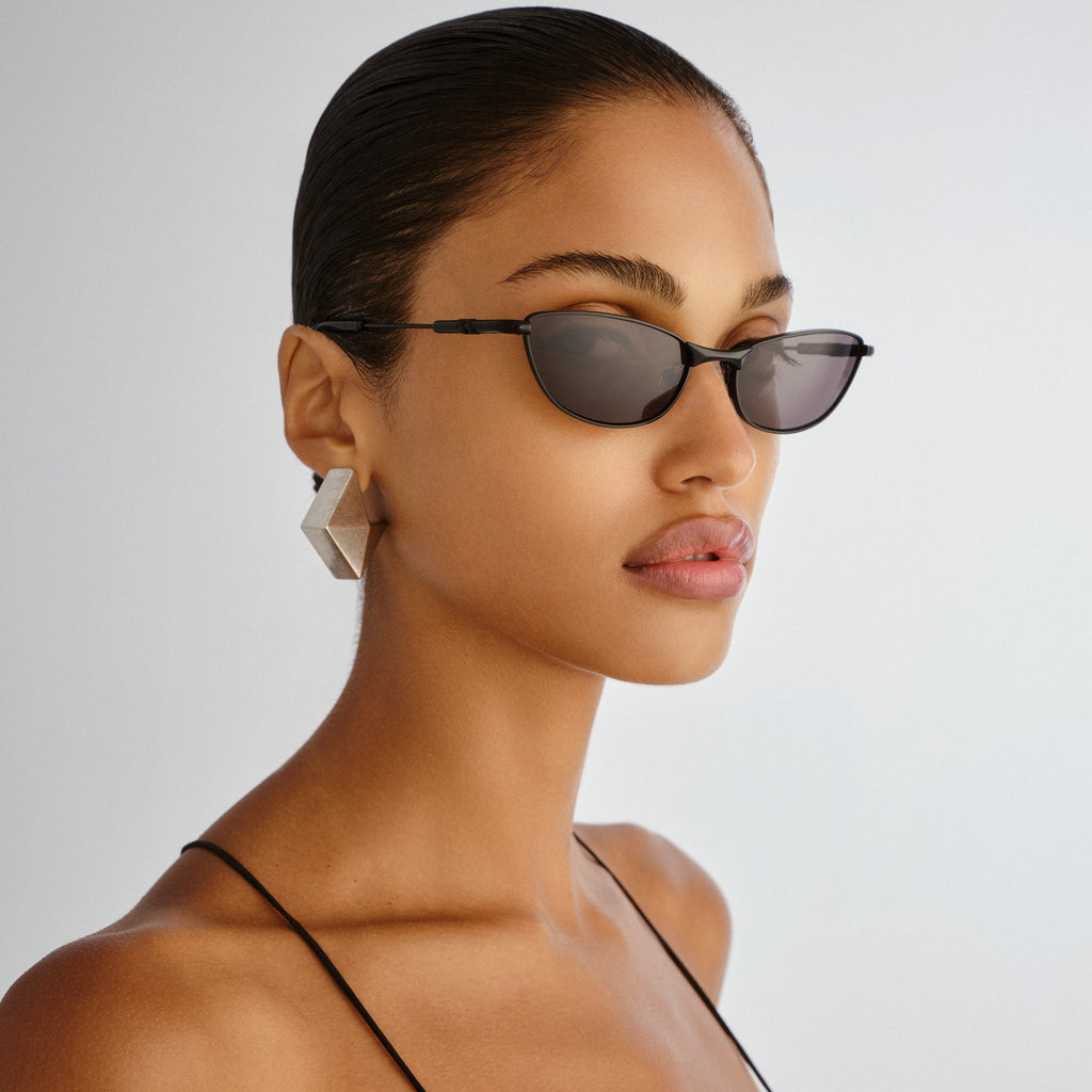 Le Specs Thorned Black Uni-Sex Oval Sunglasses | Eyewear Index