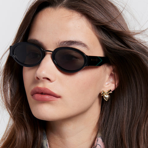 Karen Walker All Out Black Uni-Sex Oval Sunglasses | Eyewear Index