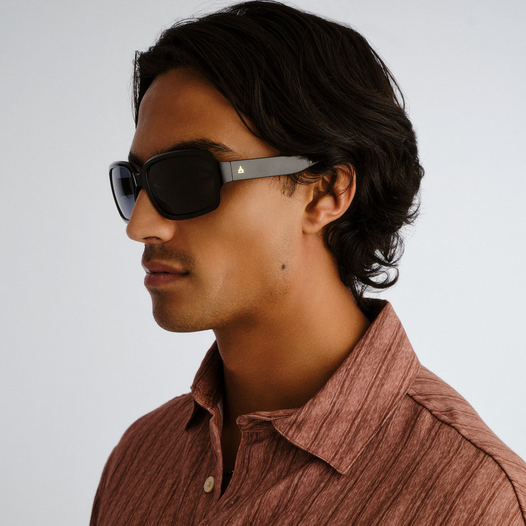 Aire Ignite Black Uni-Sex Wrap Sunglasses | Eyewear Index