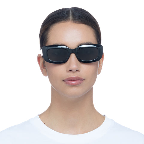 Aire Orbit Black Uni-Sex Rectangle Sunglasses | Eyewear Index