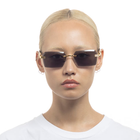 Aire Nebula Bright Gold Black Uni-Sex Rectangle Sunglasses | Eyewear Index