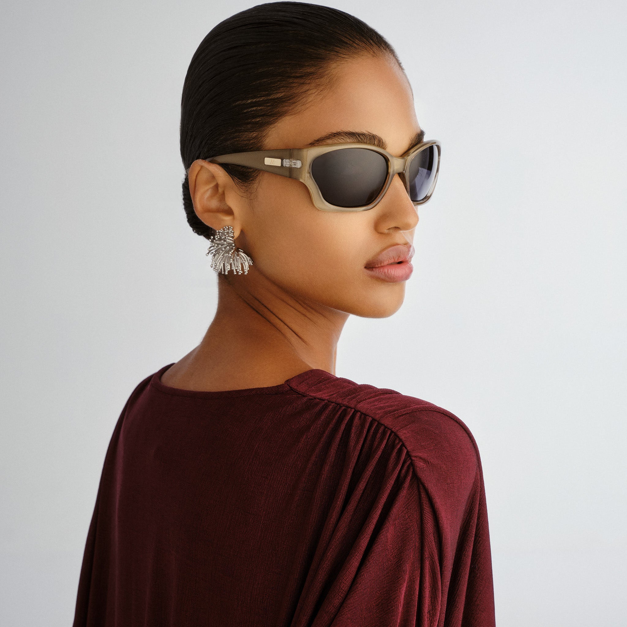 Le Specs Salacious Olive Pearl Uni-Sex Wrap Sunglasses | Eyewear Index