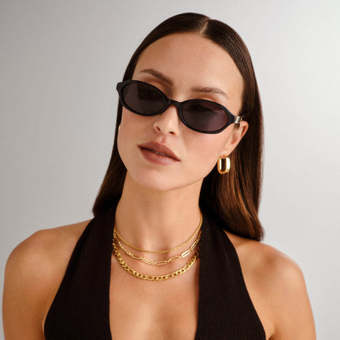 Le Specs Lunita Black Female Oval Sunglasses | Eyewear Index