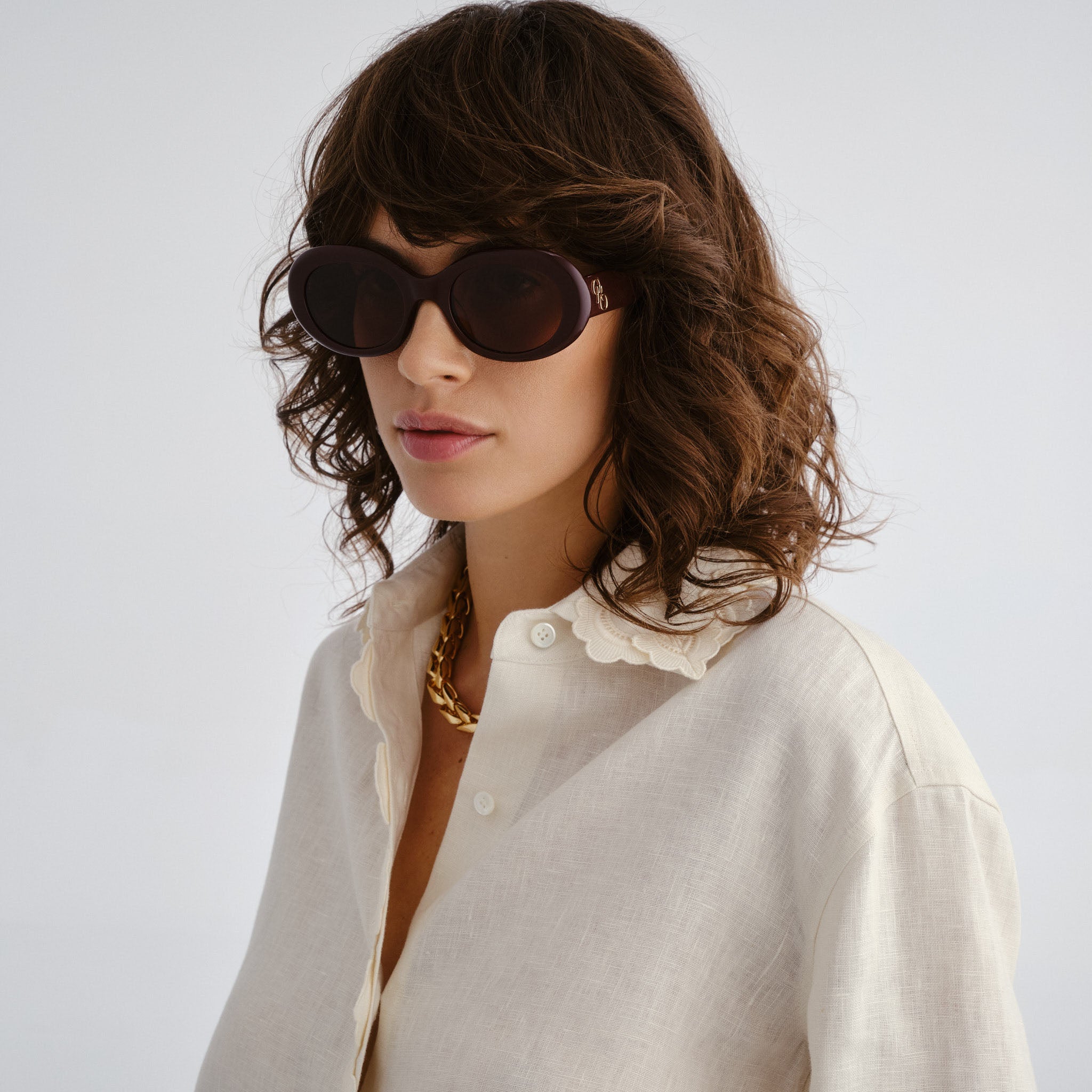 Oroton Soren Burgundy Female Oval Sunglasses | Eyewear Index