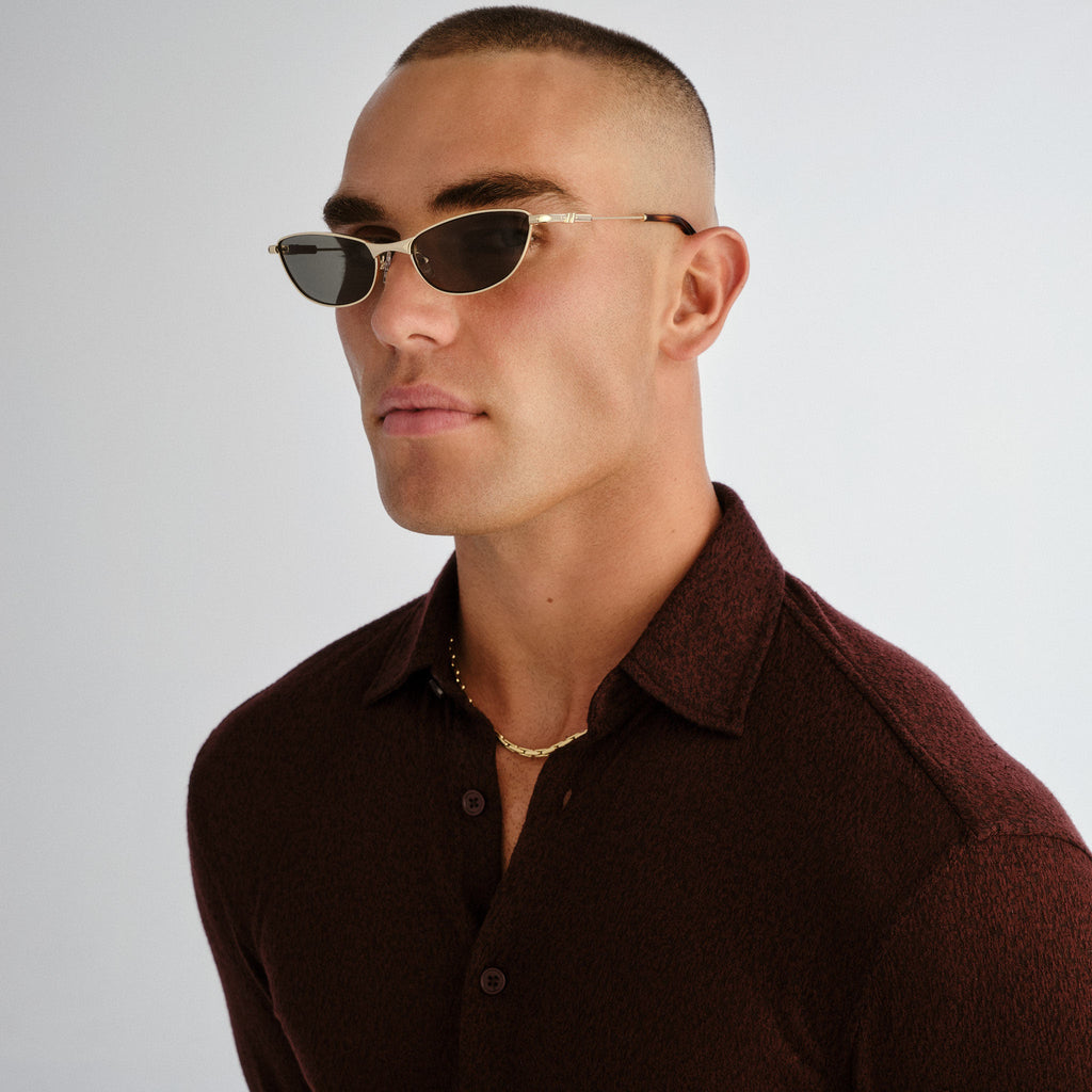Le Specs Thorned Gold Uni-Sex Oval Sunglasses | Eyewear Index