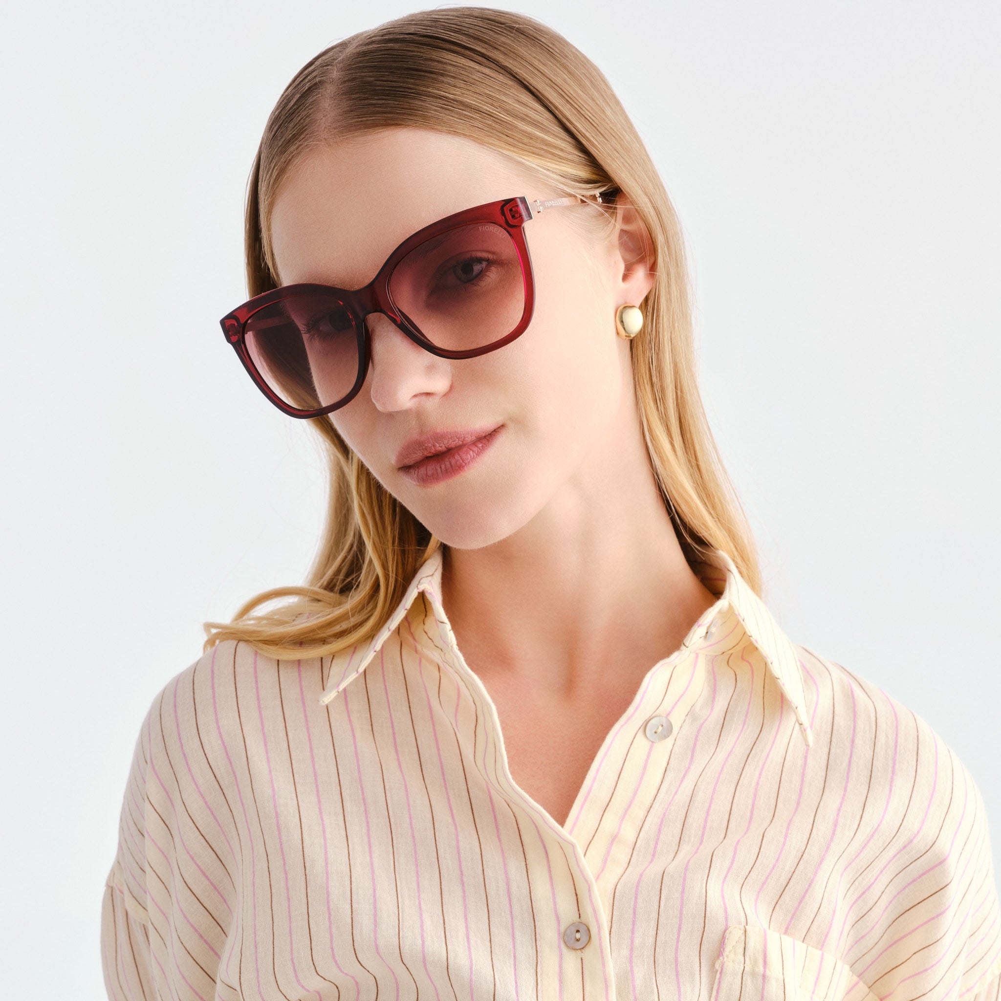 Fiorelli Aurea Plum Female Cat-Eye Sunglasses | Eyewear Index
